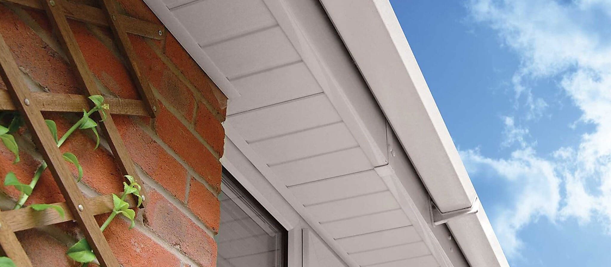 White PVCu fascias and soffits fitted along a roofline